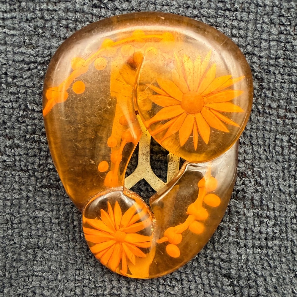 Vintage Apple Juice Bakelite Dress Clip Reverse Carved Floral Daisy 2.5"